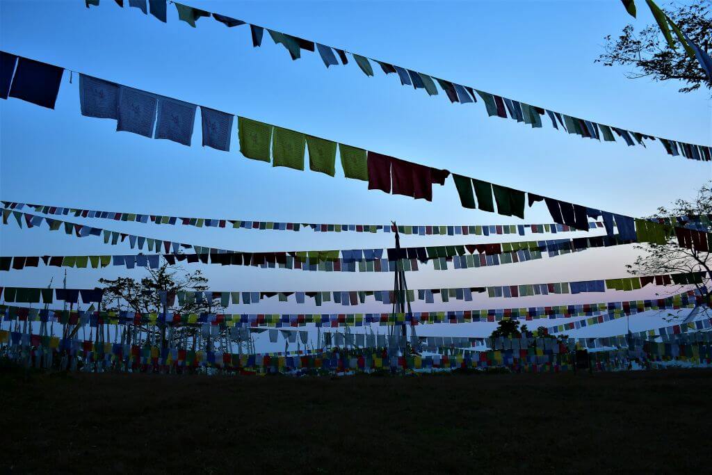 Prayer flags at dusk in Kharbandi, Phuentsholing